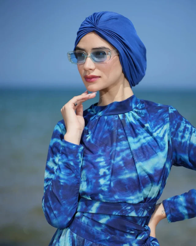 🌊 Azure Blue Swim Turban – Style Meets Comfort
Shine in vibrant azure! This chic swim turban adds a bold, elegant touch to any beach look — flattering, modest, and modern.
✅ Perfect fit – soft, stretchy, and stays in place
✅ Quick-dry & chlorine-resistant – ideal for swimming or lounging
✅ Breathable & machine-washable – made for daily summer adventures
Slip it on and dive in — style, comfort, and coverage in one.